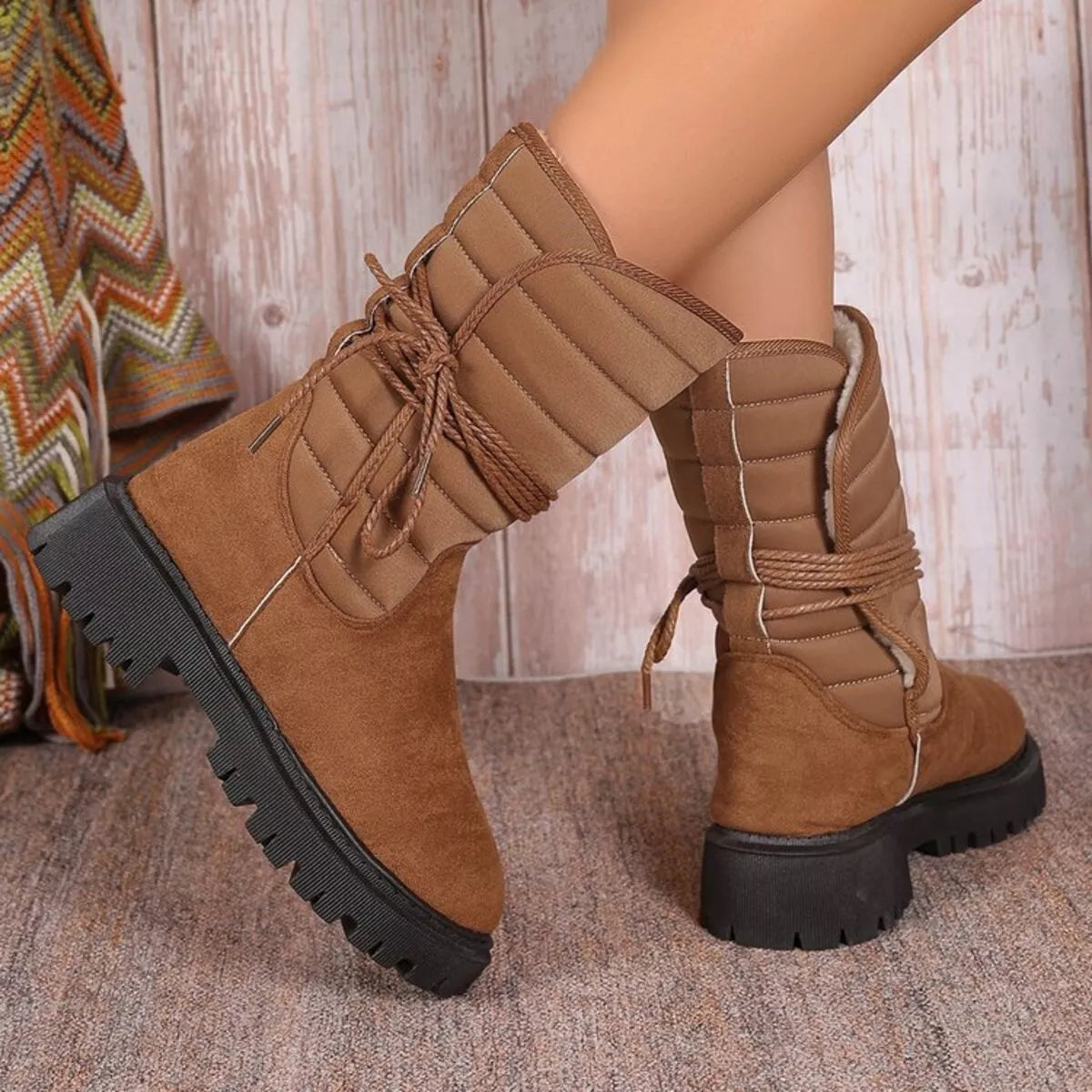 Quilted lace up mid calf boots detail shot