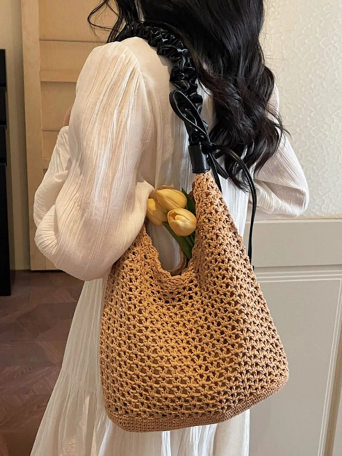 Khaki straw shoulder bag styled with summer outfit
