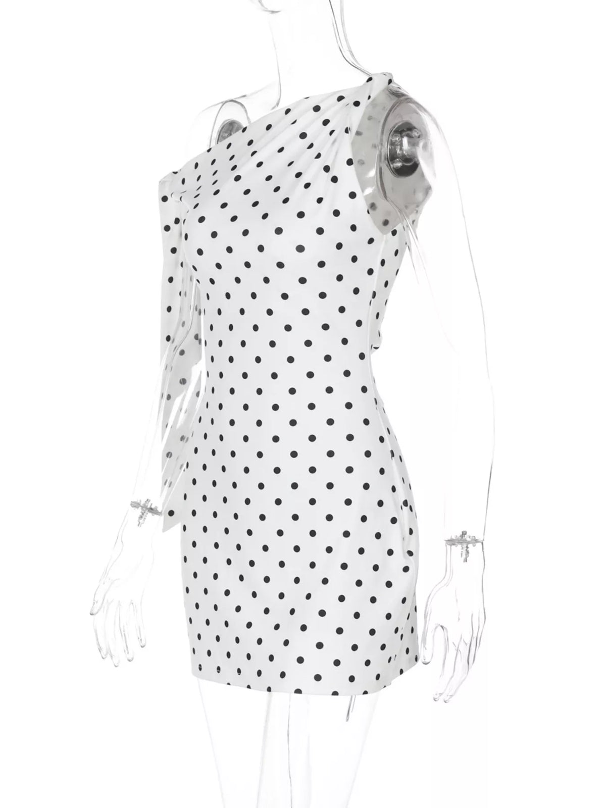 Split hem detail on the black polka dot mini dress