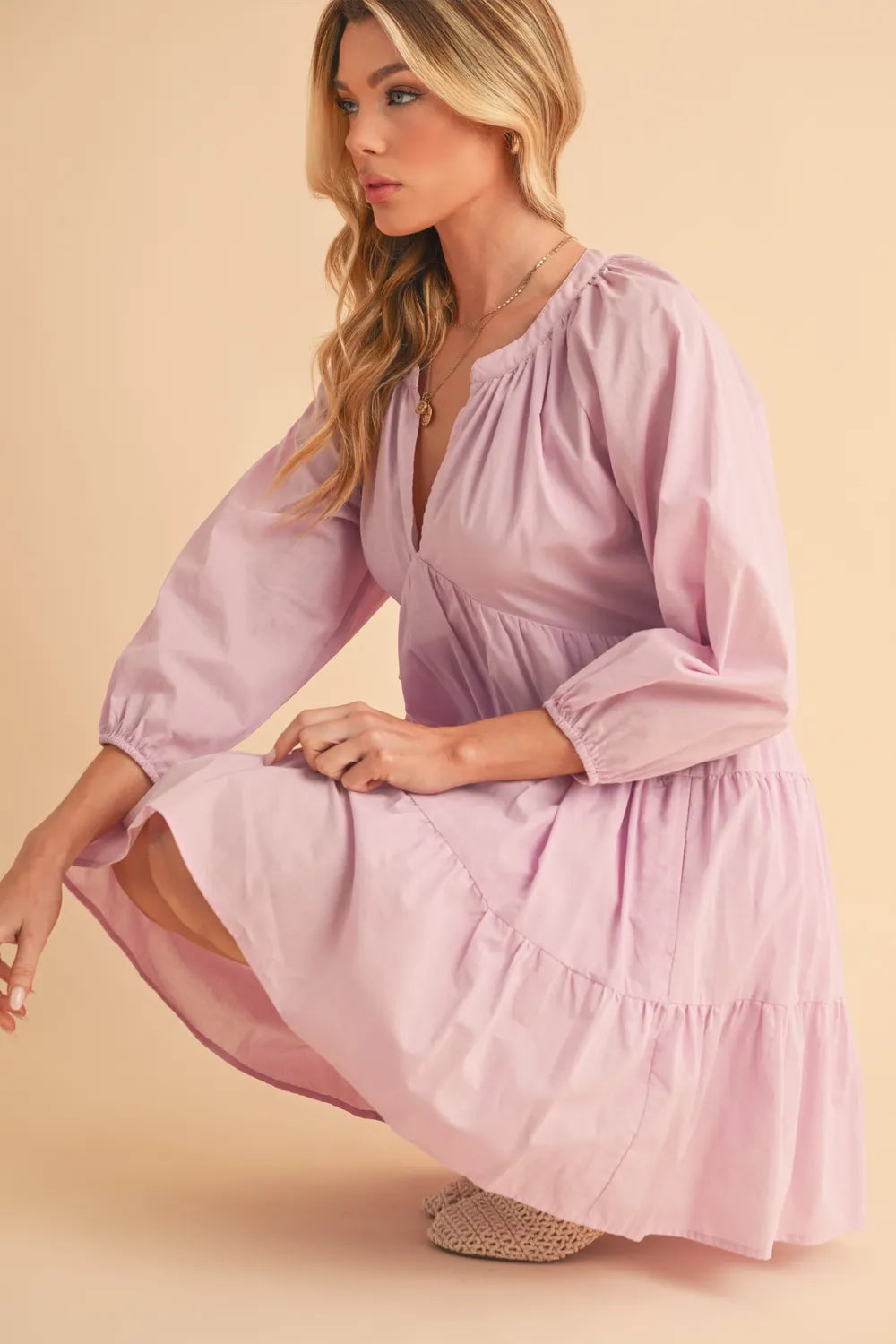 Neckline detail on notched balloon sleeve dress