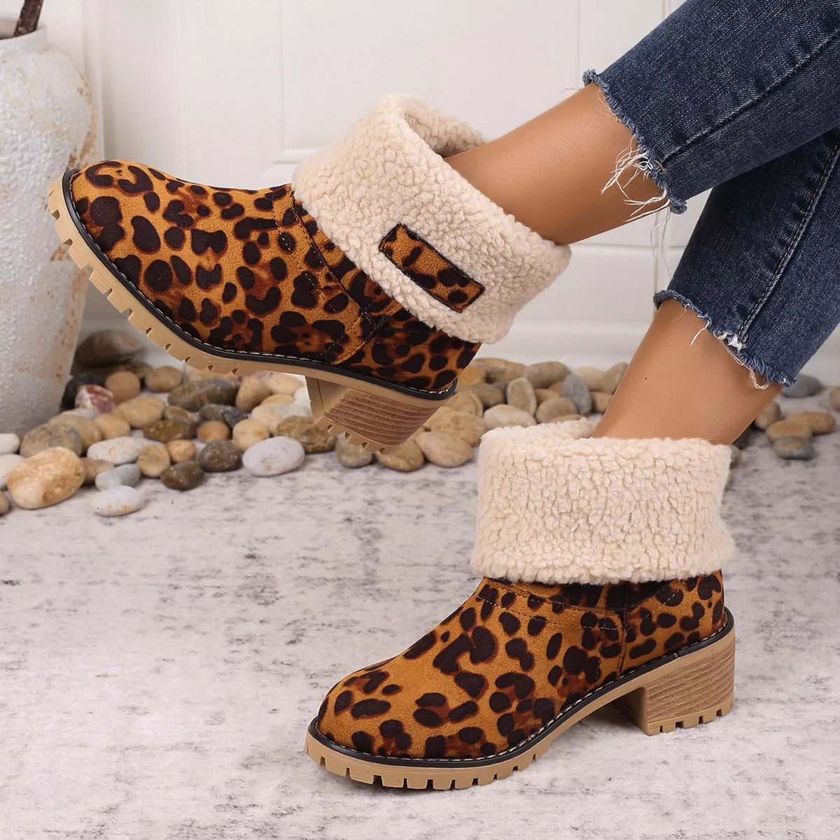 Leopard boots worn with denim