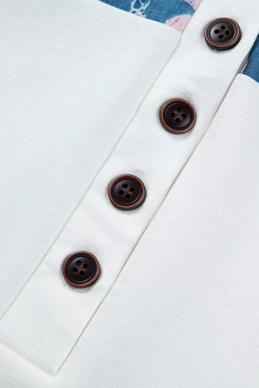 White floral print tee fabric detail