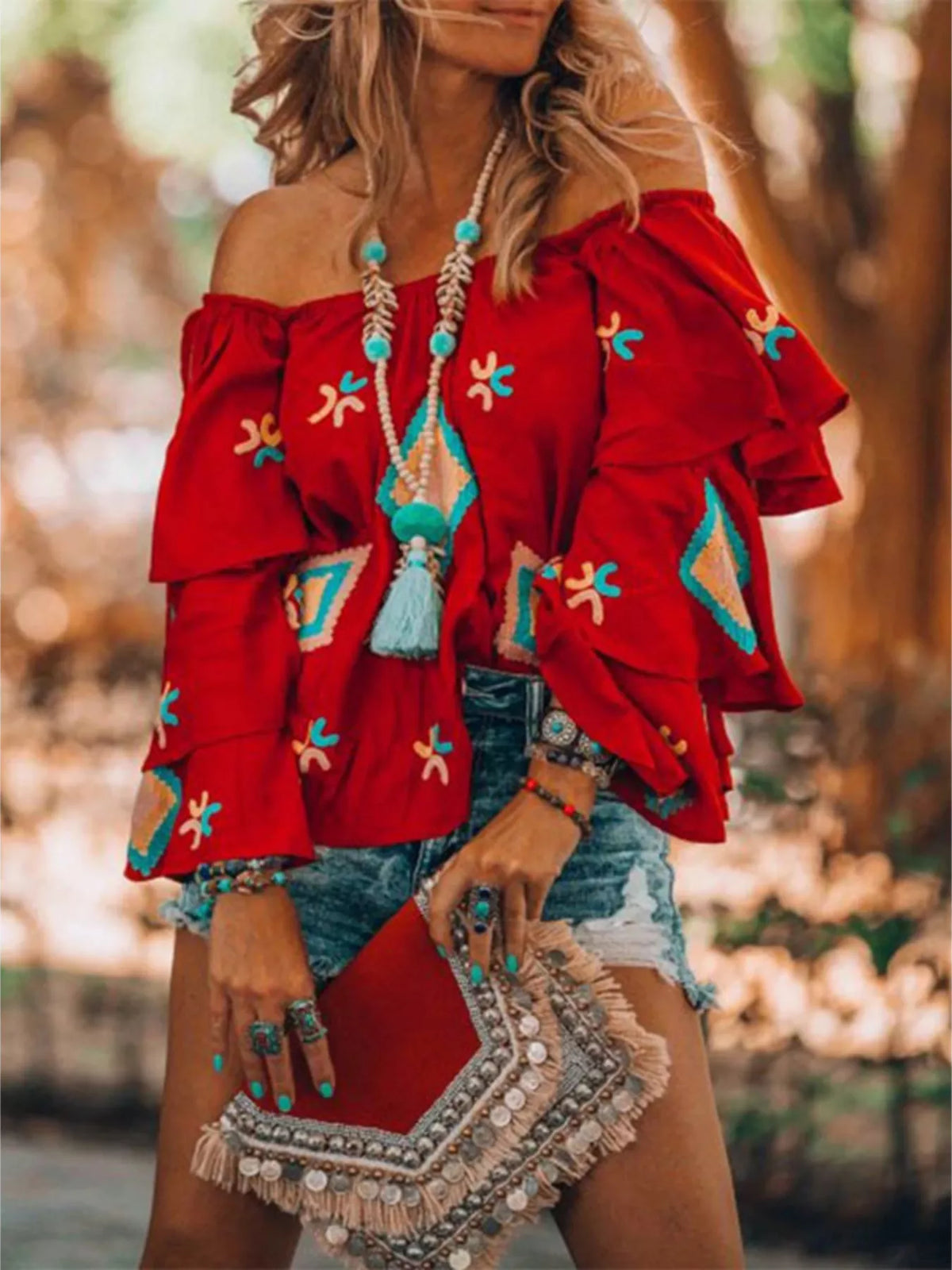Red off shoulder blouse angled view