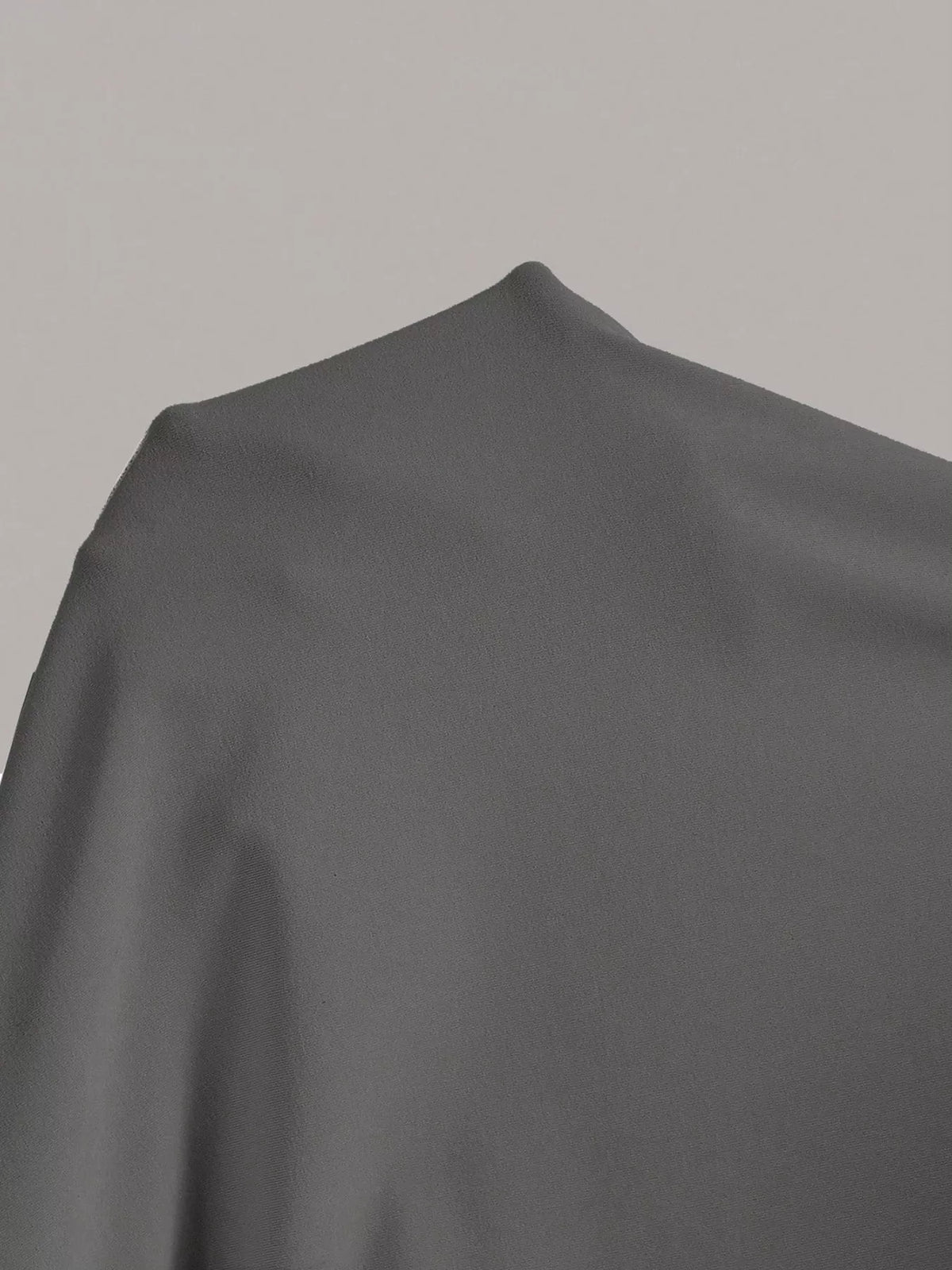 Close up of the round neckline and shoulder seam