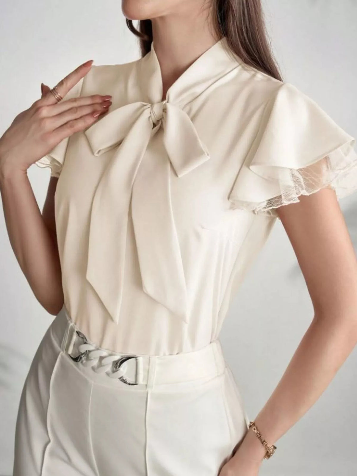 Tan tie neck ruffle sleeve lace blouse, full length view