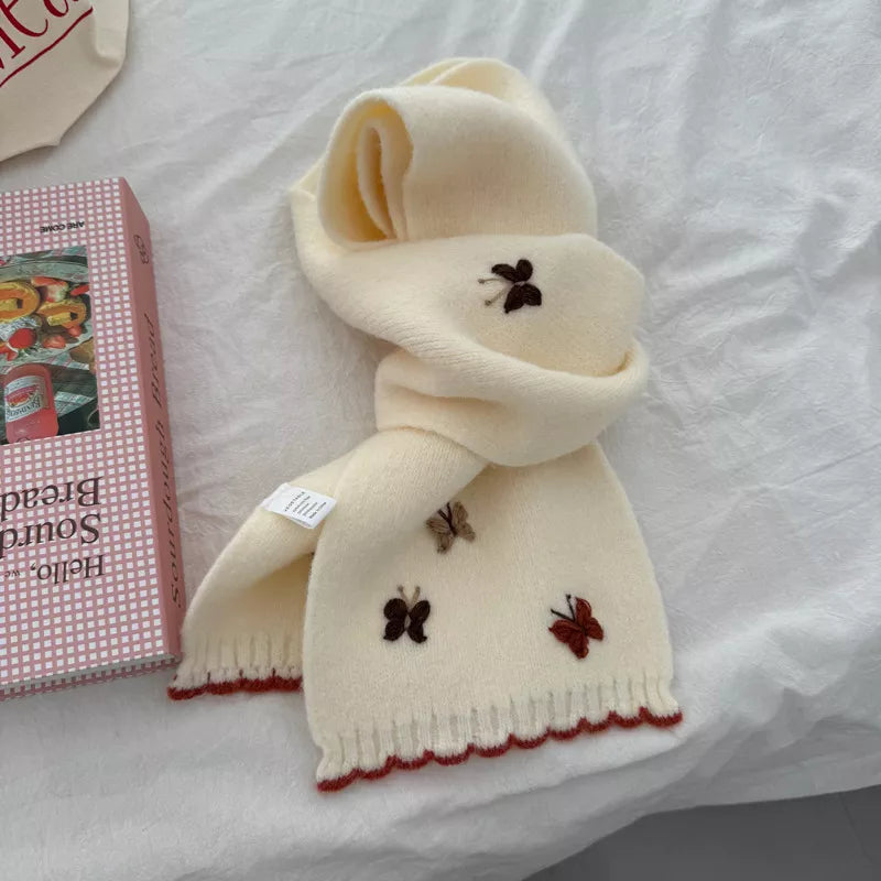 Butterfly scarf laid flat to show the embroidery