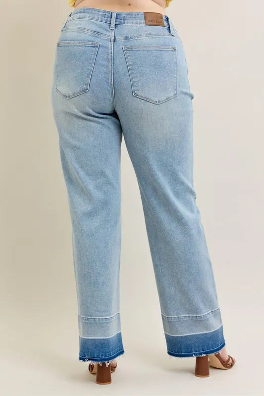 Full outfit featuring light wash wide leg jeans