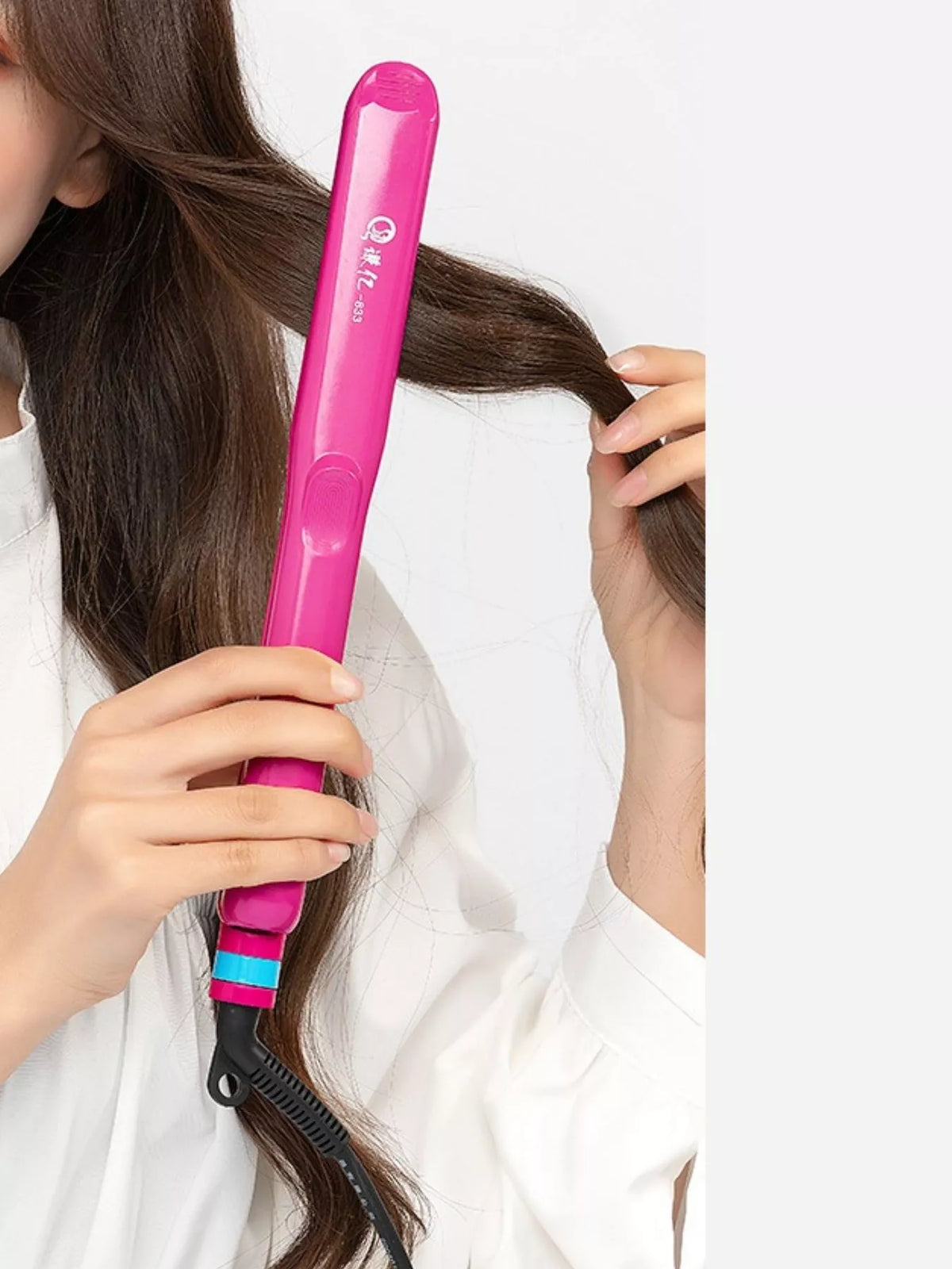 Pink hair straightener side view