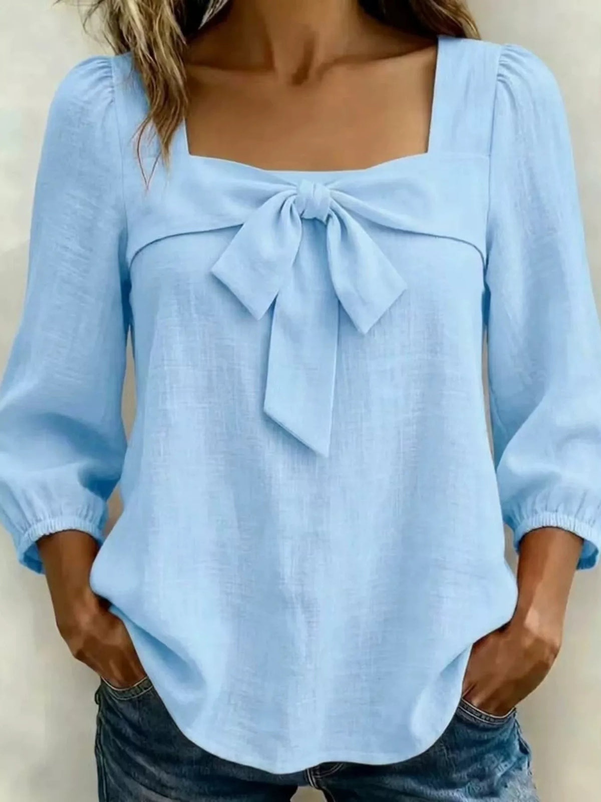 Sky blue bow front blouse front view