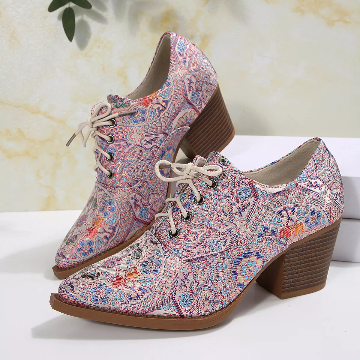 Point toe ankle boots side profile