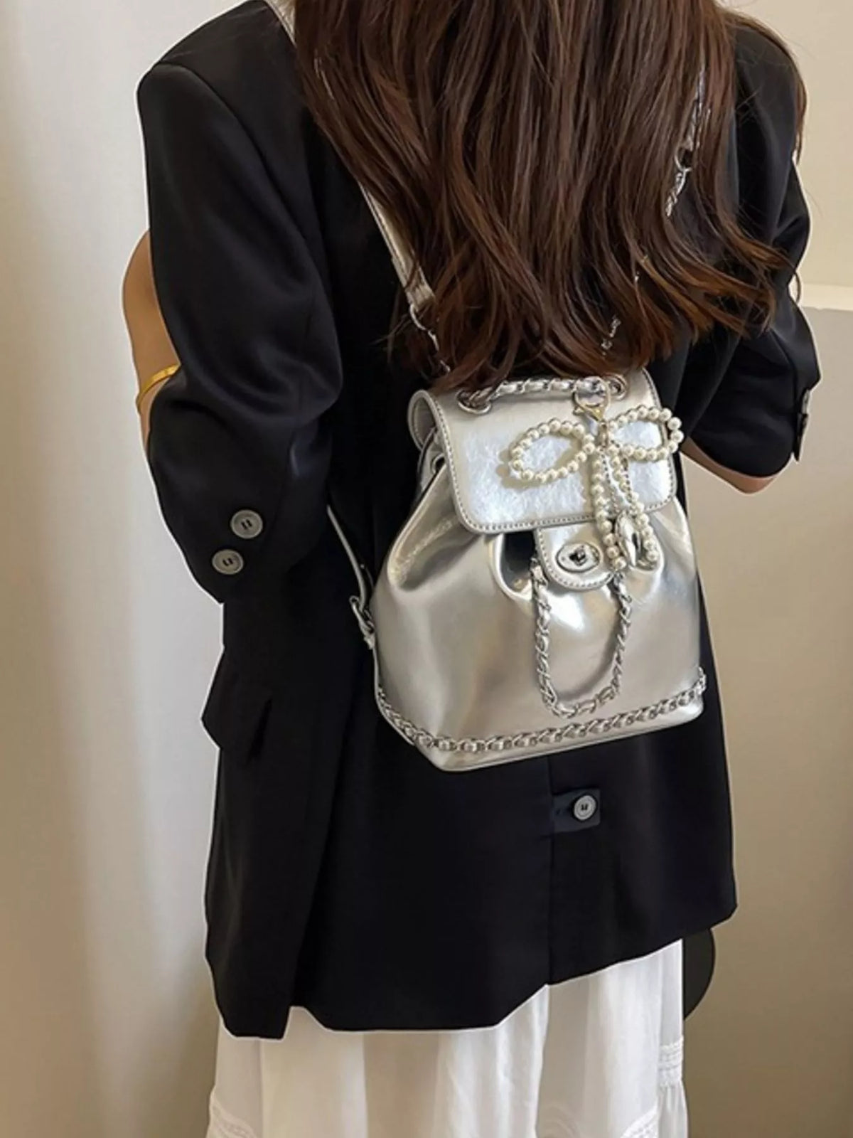 silver pearl mini backpack close up of the material