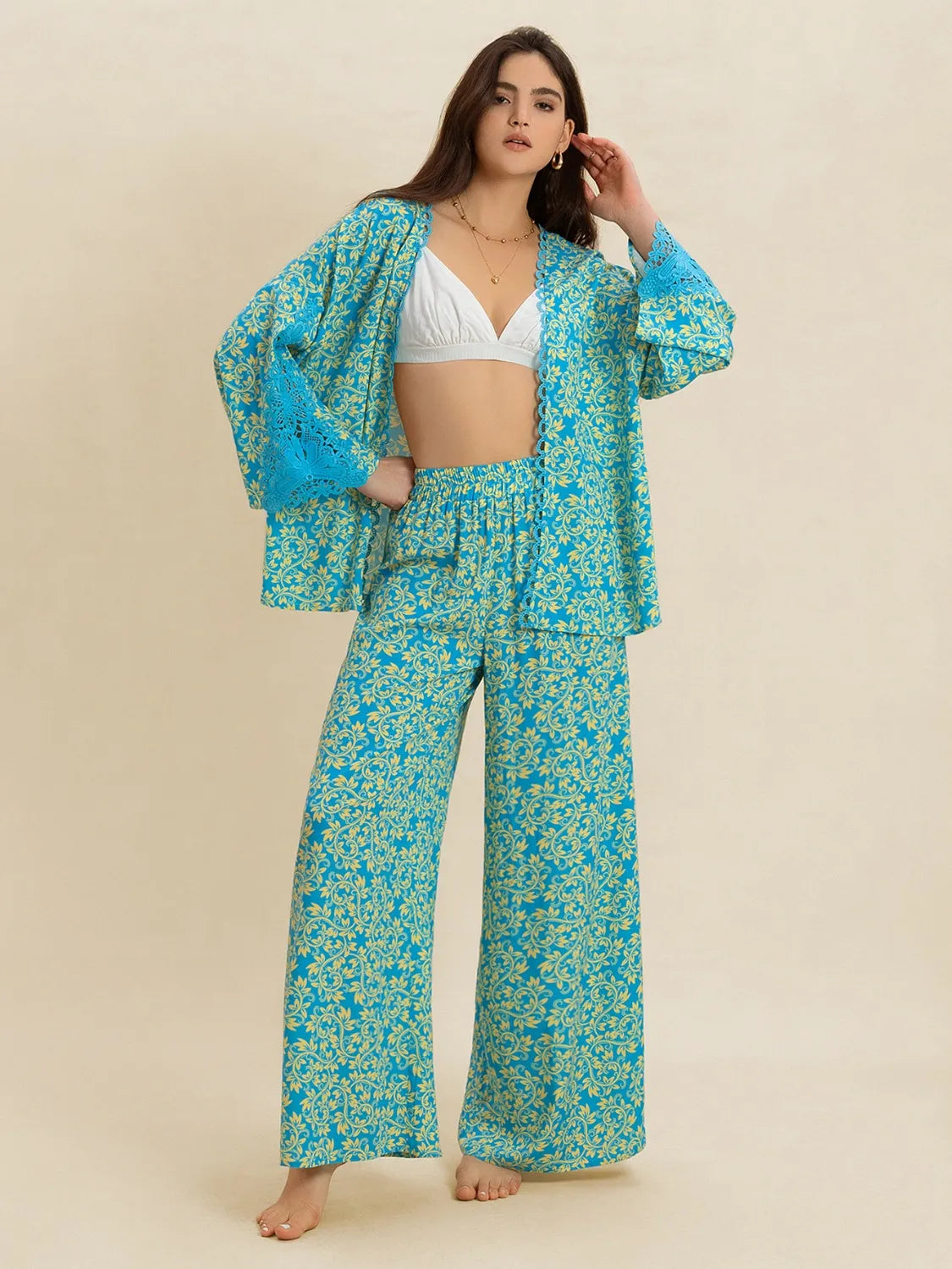 Lace detail of the teal printed top