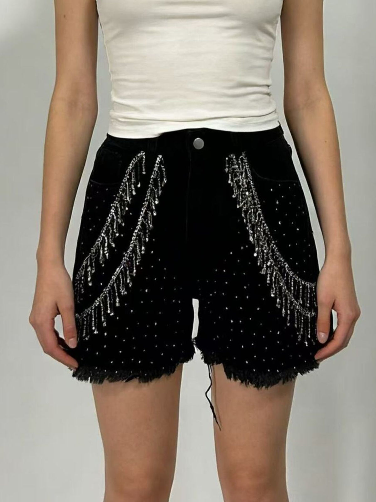 Back view of rhinestone denim shorts