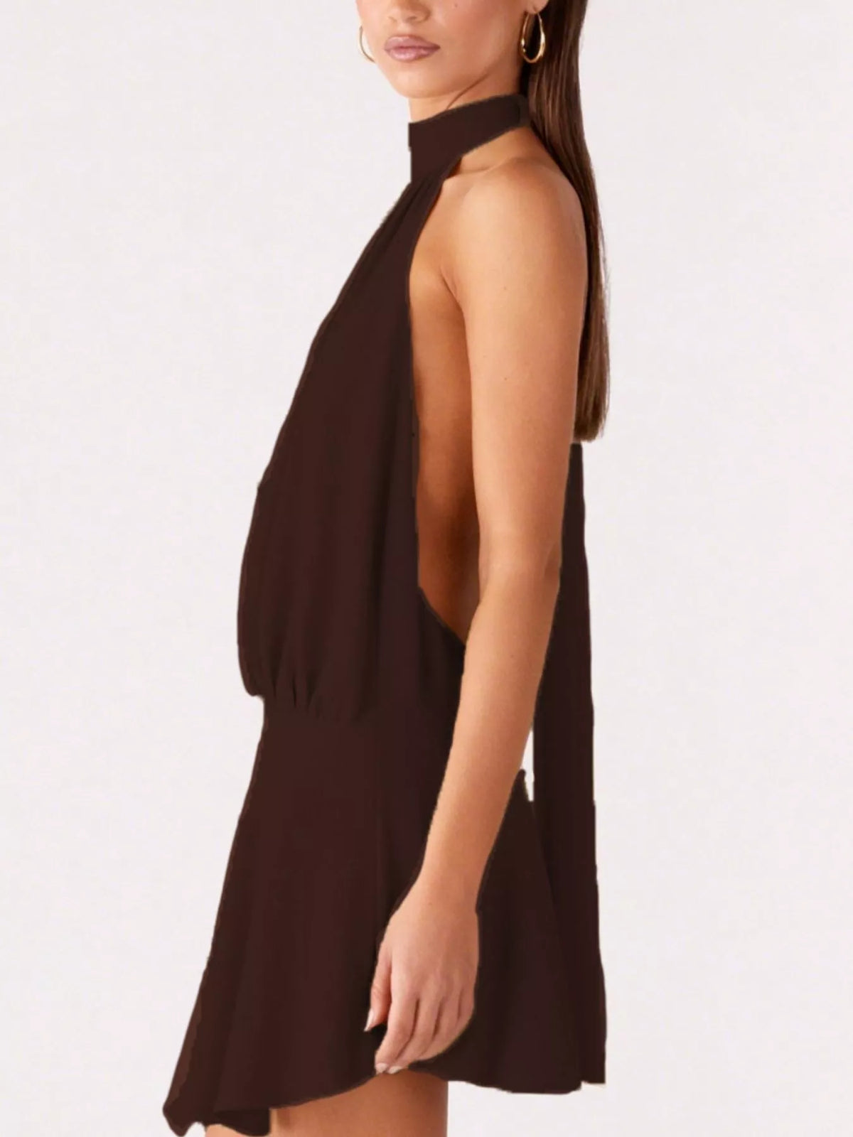 Side view of the womens backless halter neck dress