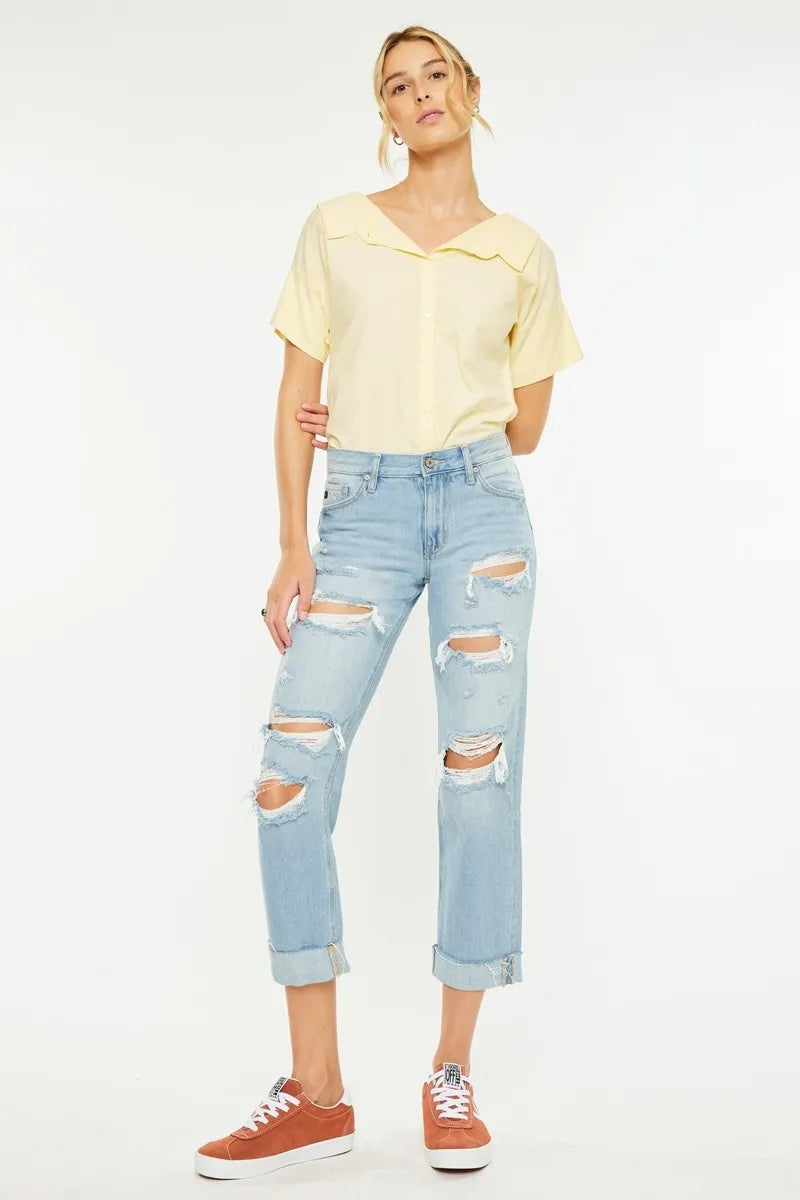 Light wash mid rise distressed boyfriend jeans front view