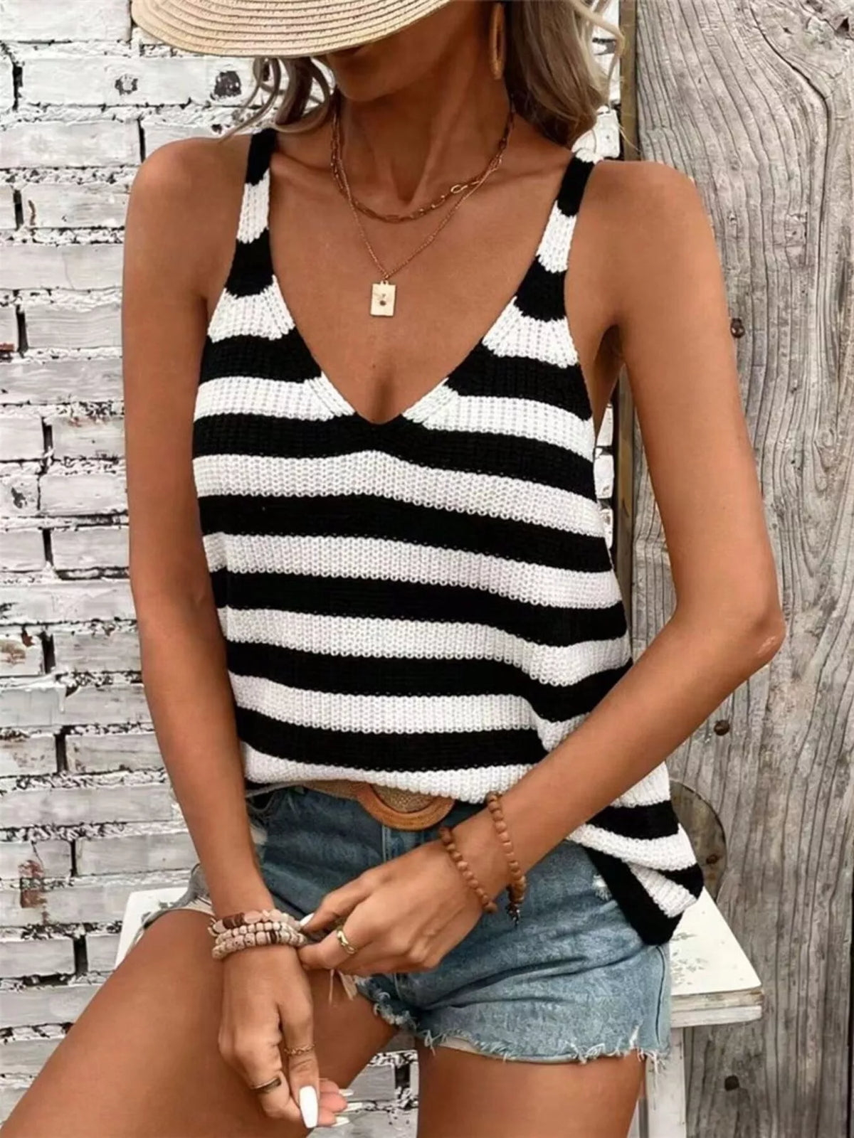 Striped tank styled with jeans full length view