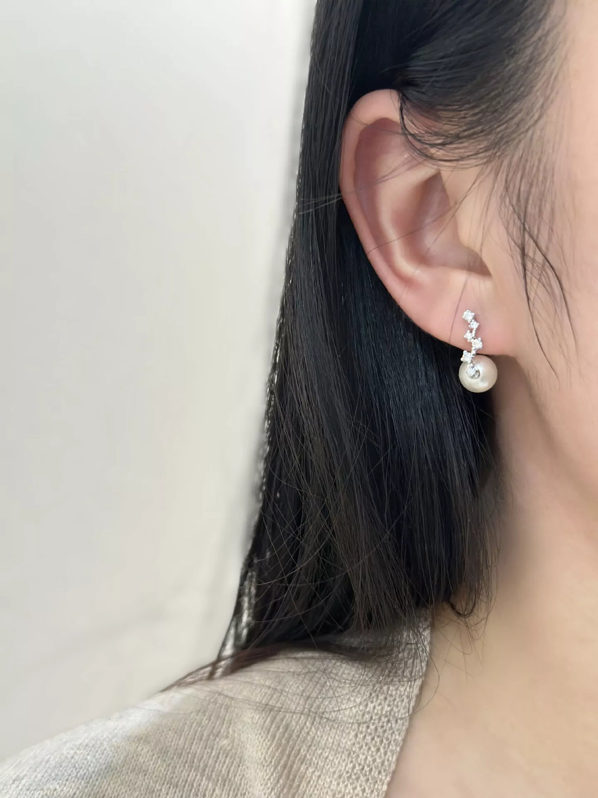 Ivory sterling silver zircon earrings close up