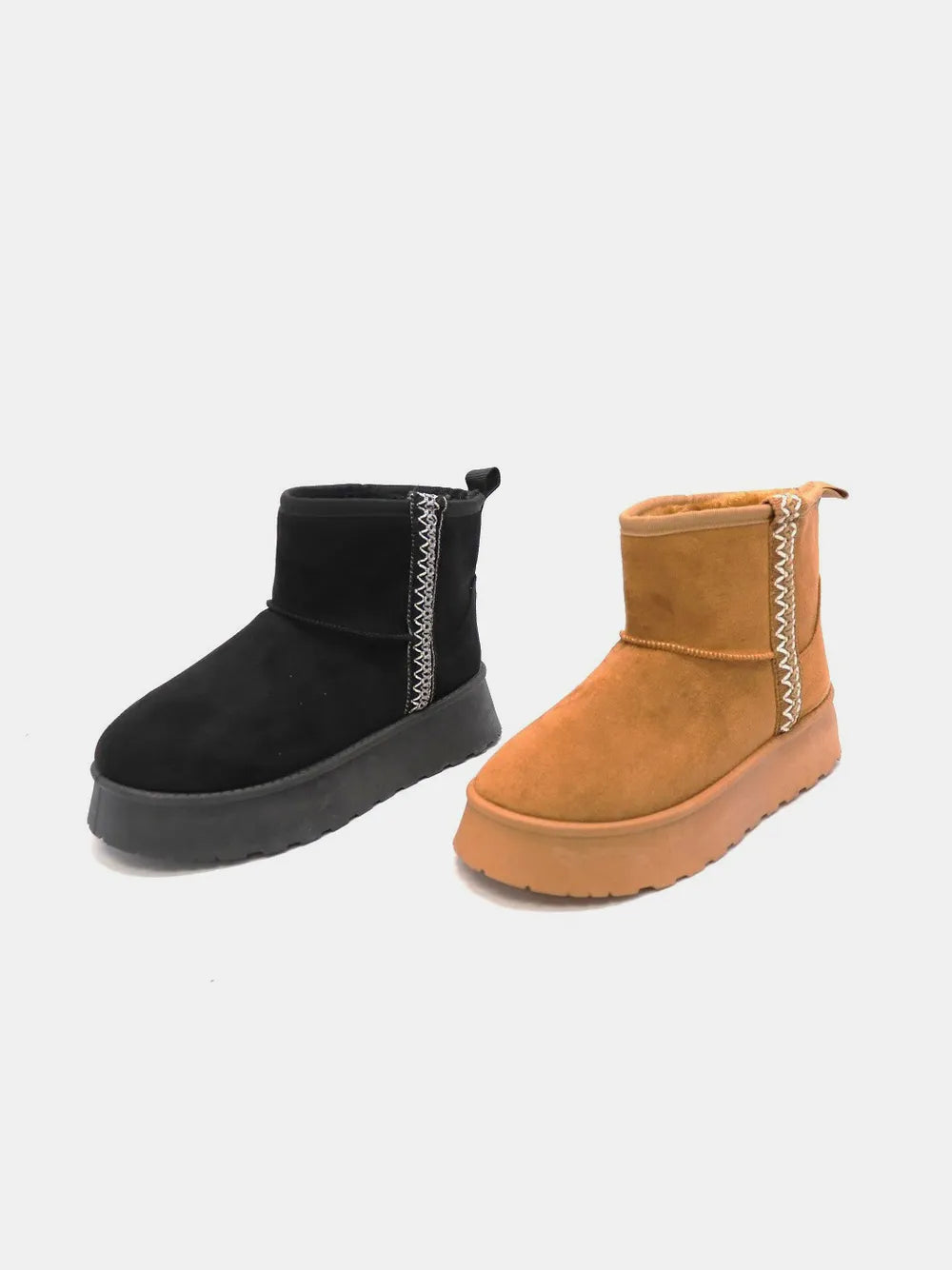 Black suede platform boots styled on model
