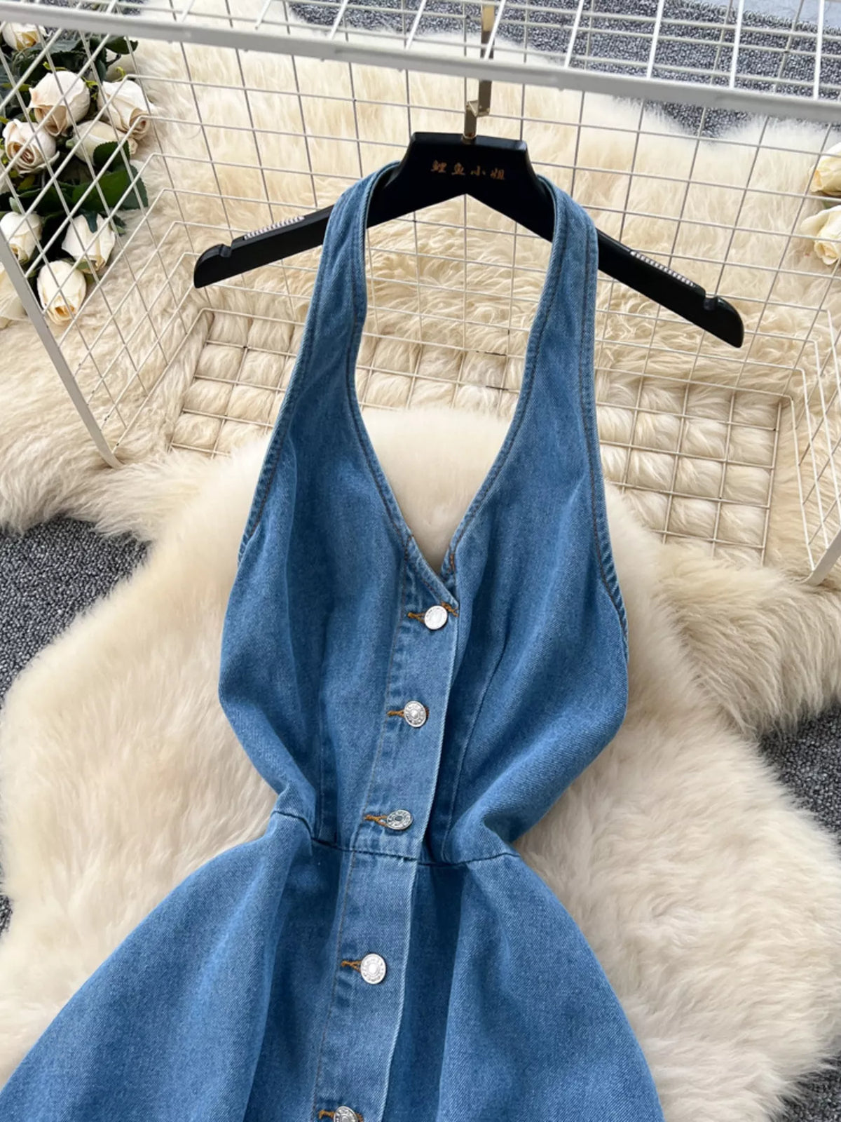 Blue halter neck button down denim dress back view