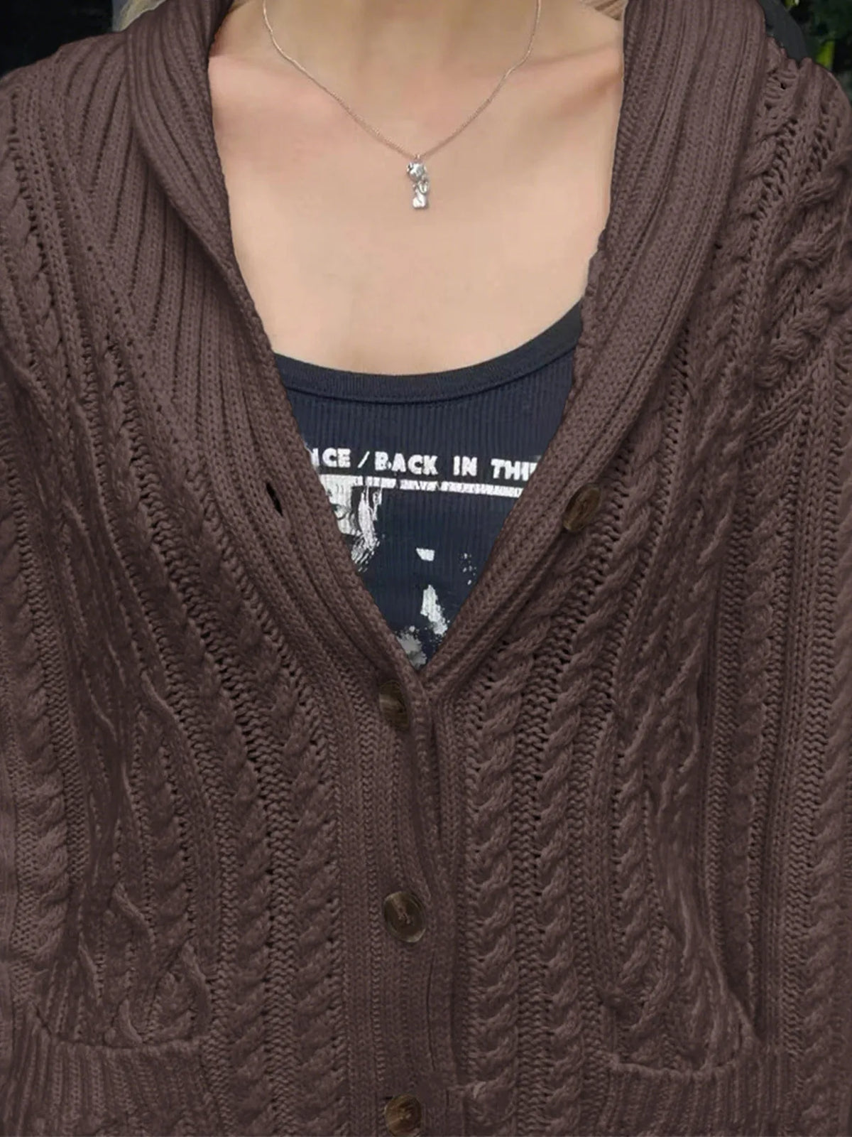cable knit button up cardigan knit texture close up