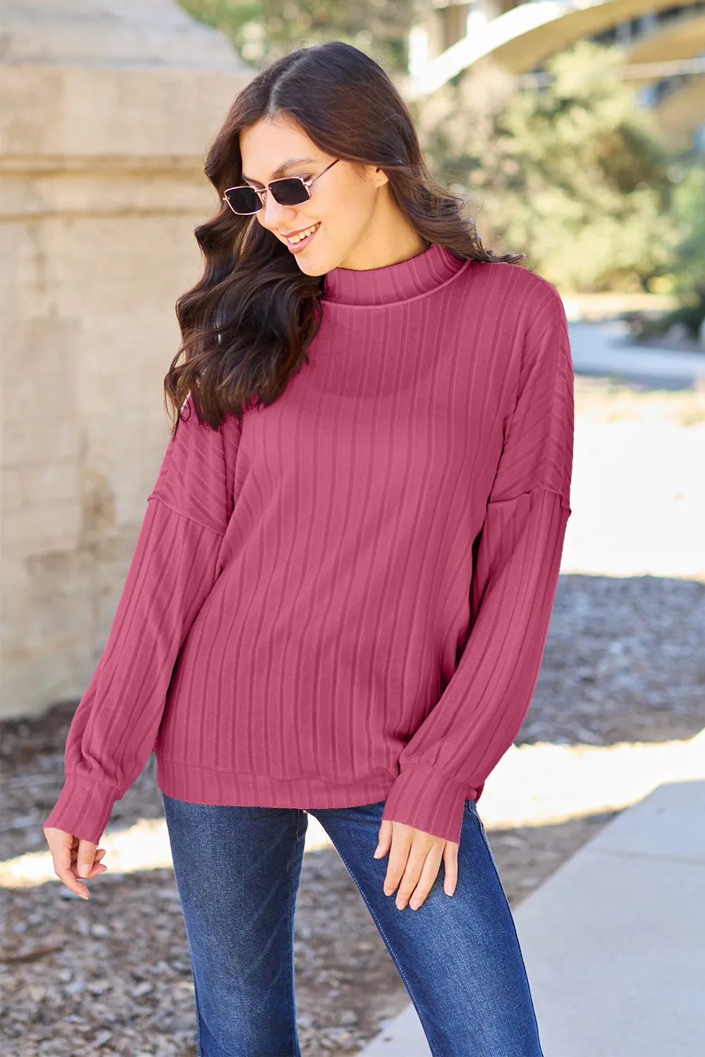 Close up of mock neck collar on ribbed knit top