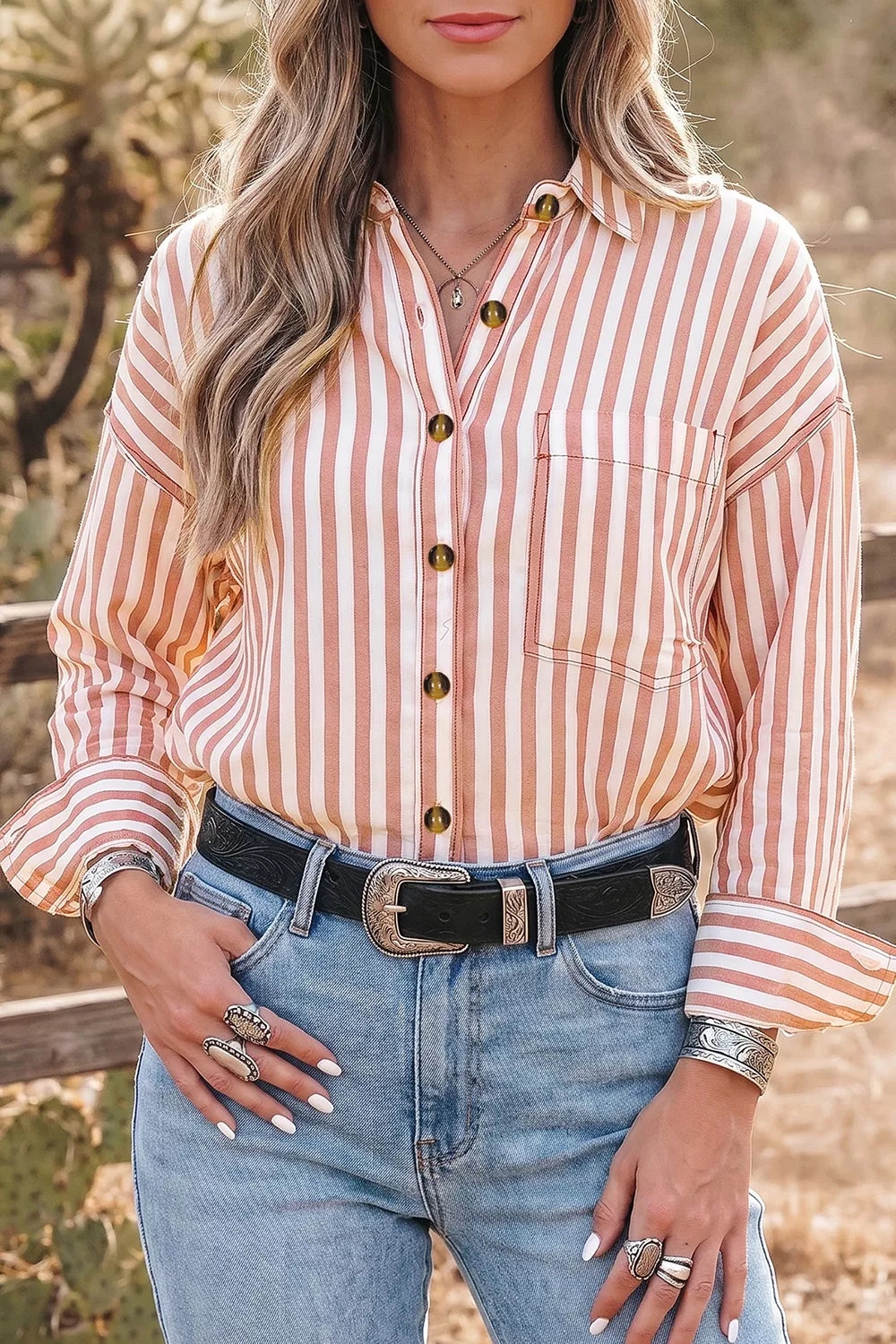Dusty pink striped western button down shirt with long sleeves