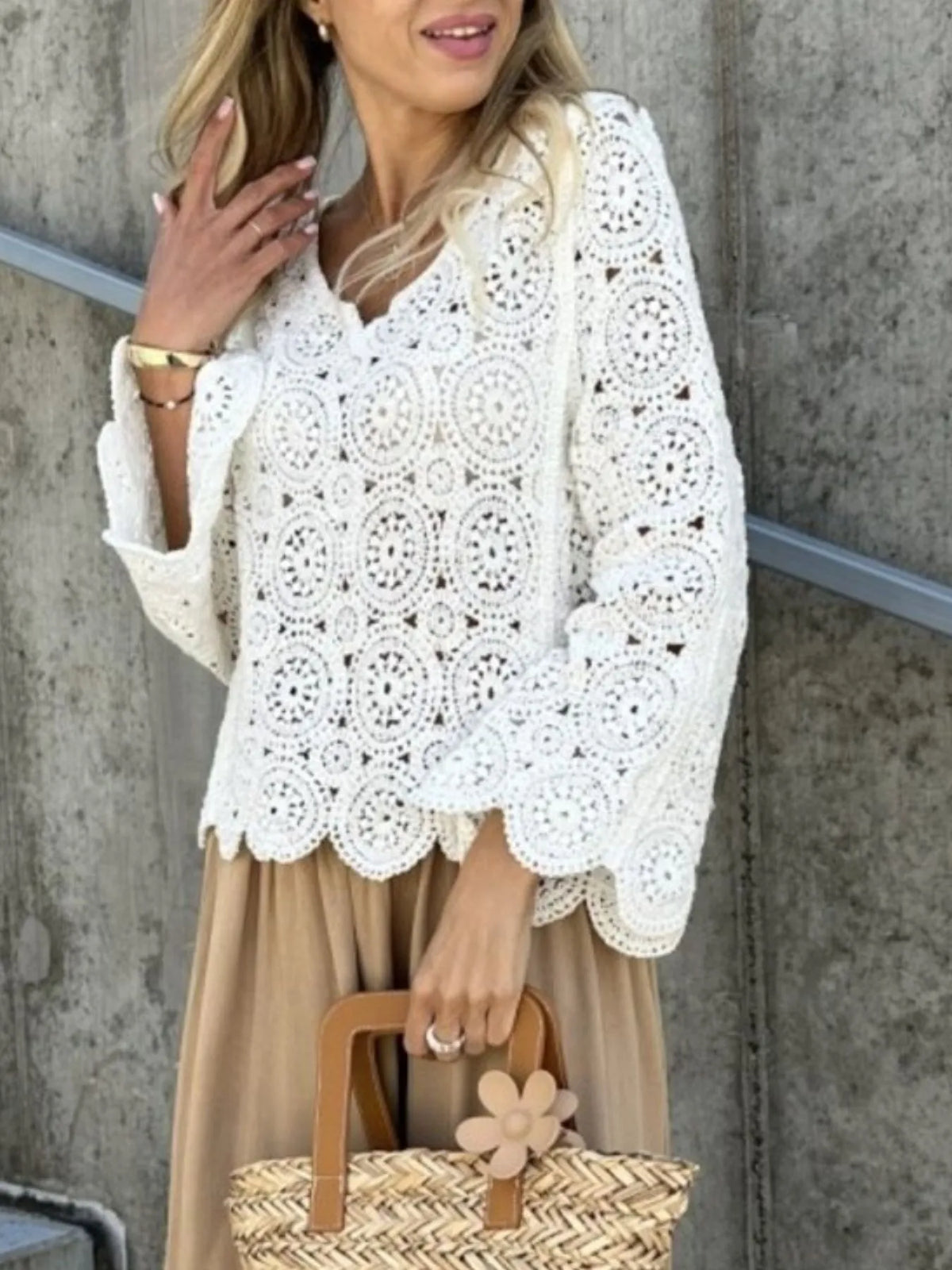 Apricot crochet top styled with jeans