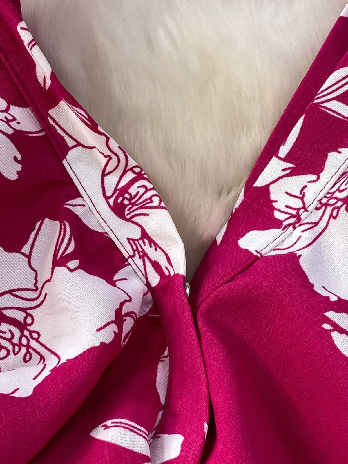 Floral print wide leg pleated jumpsuit close up view