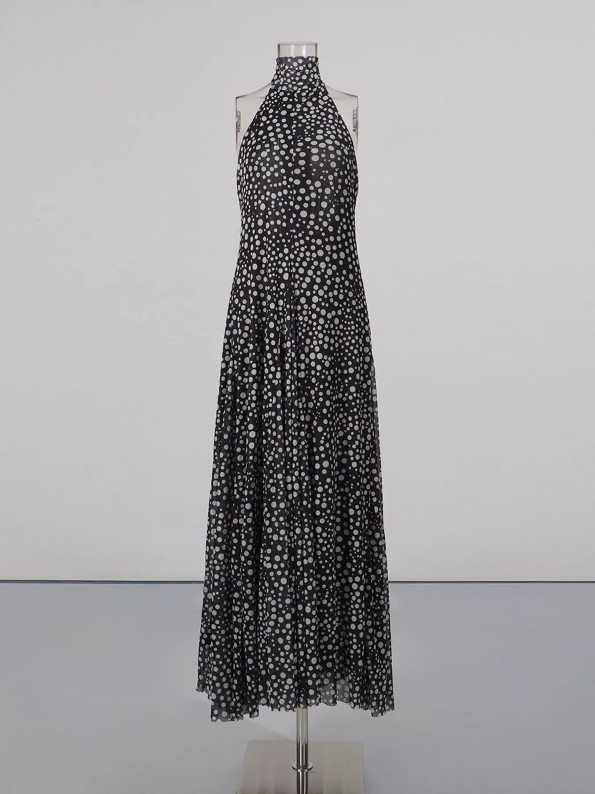 Black halter neck polka dot maxi dress, back view