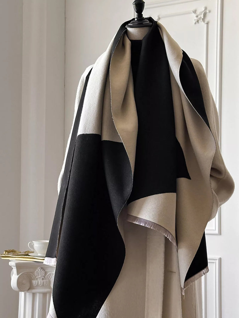 Neutral color block raw hem scarf draped around the neck