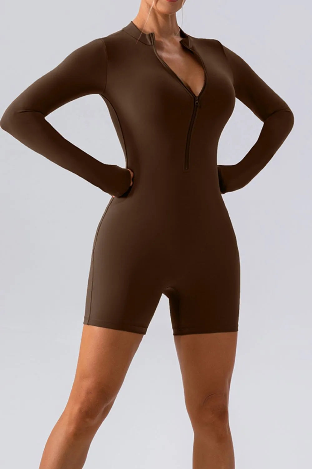 half zip active romper fabric detail