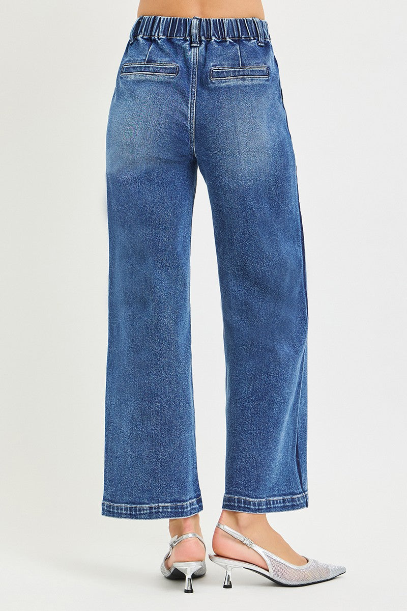 RISEN medium wash wide leg jeans hem detail
