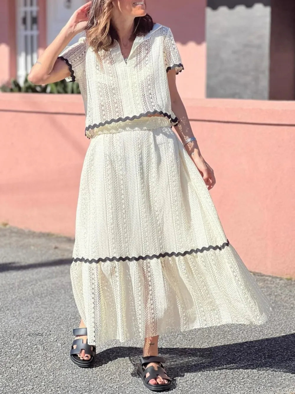 Contrast trim openwork top and skirt set cream front view