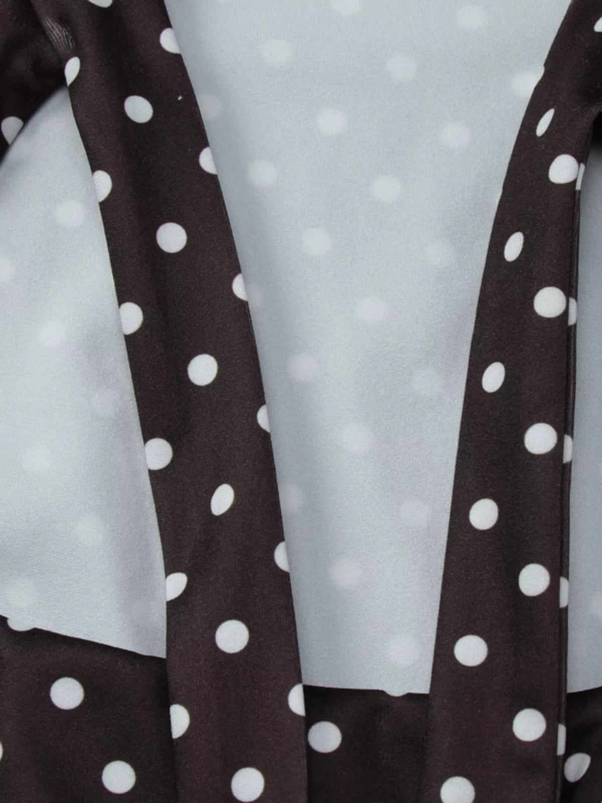 Waist tie detail on brown polka dot mini dress