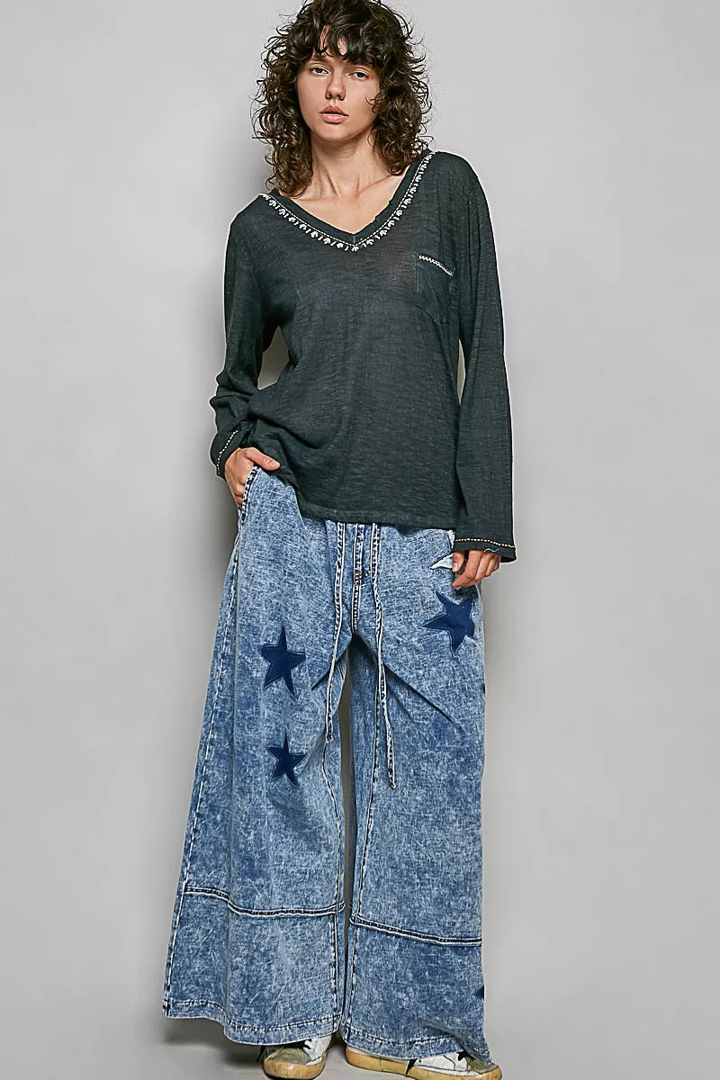 Black V neck knit top styling view