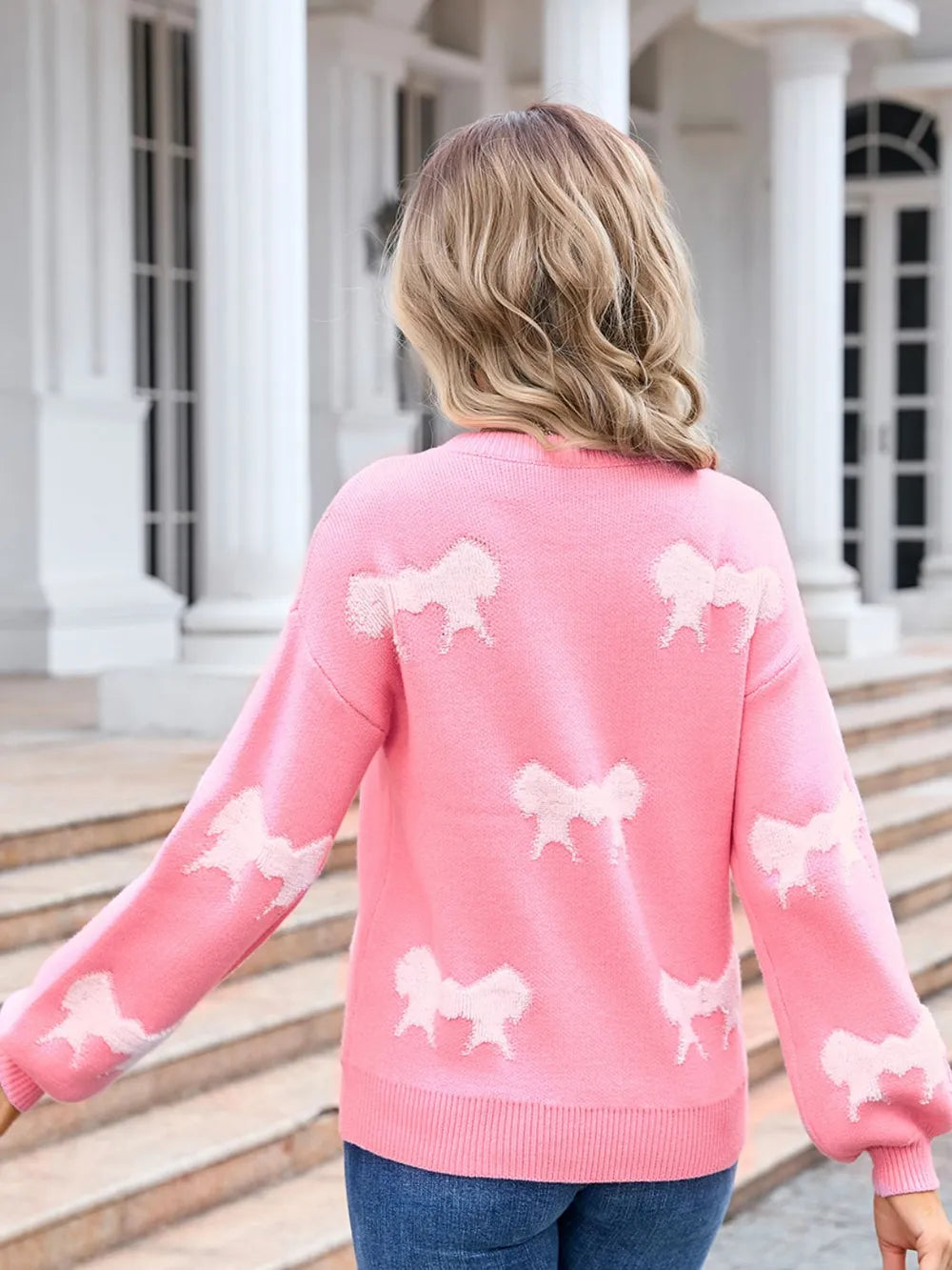 Dusty pink bow sweater detail