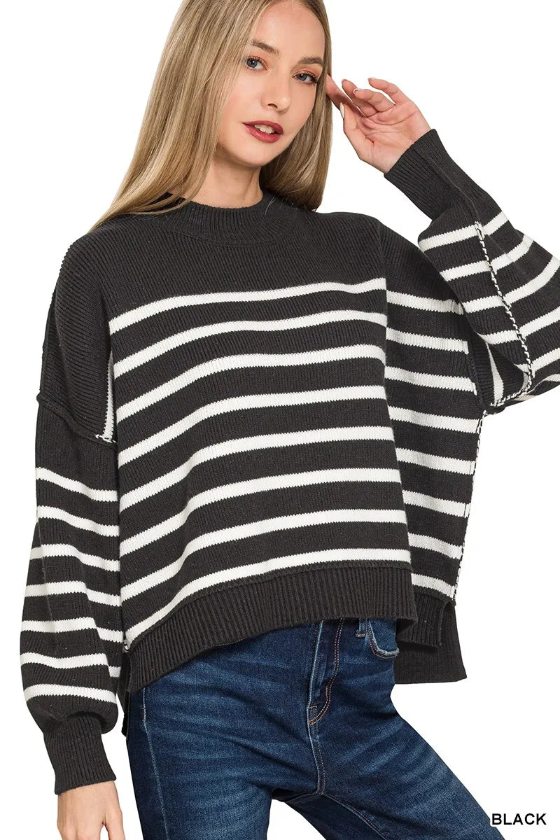 Black and white striped exposed seam oversized sweater front view