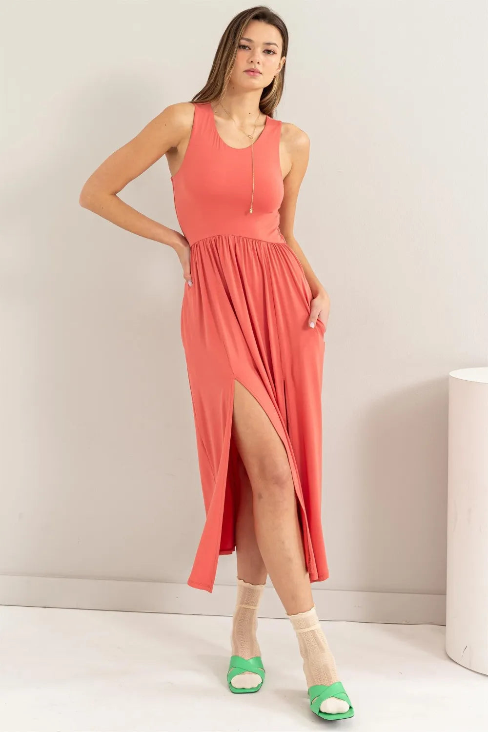 Sleeveless Slit Midi Dress in Spiced Coral side view