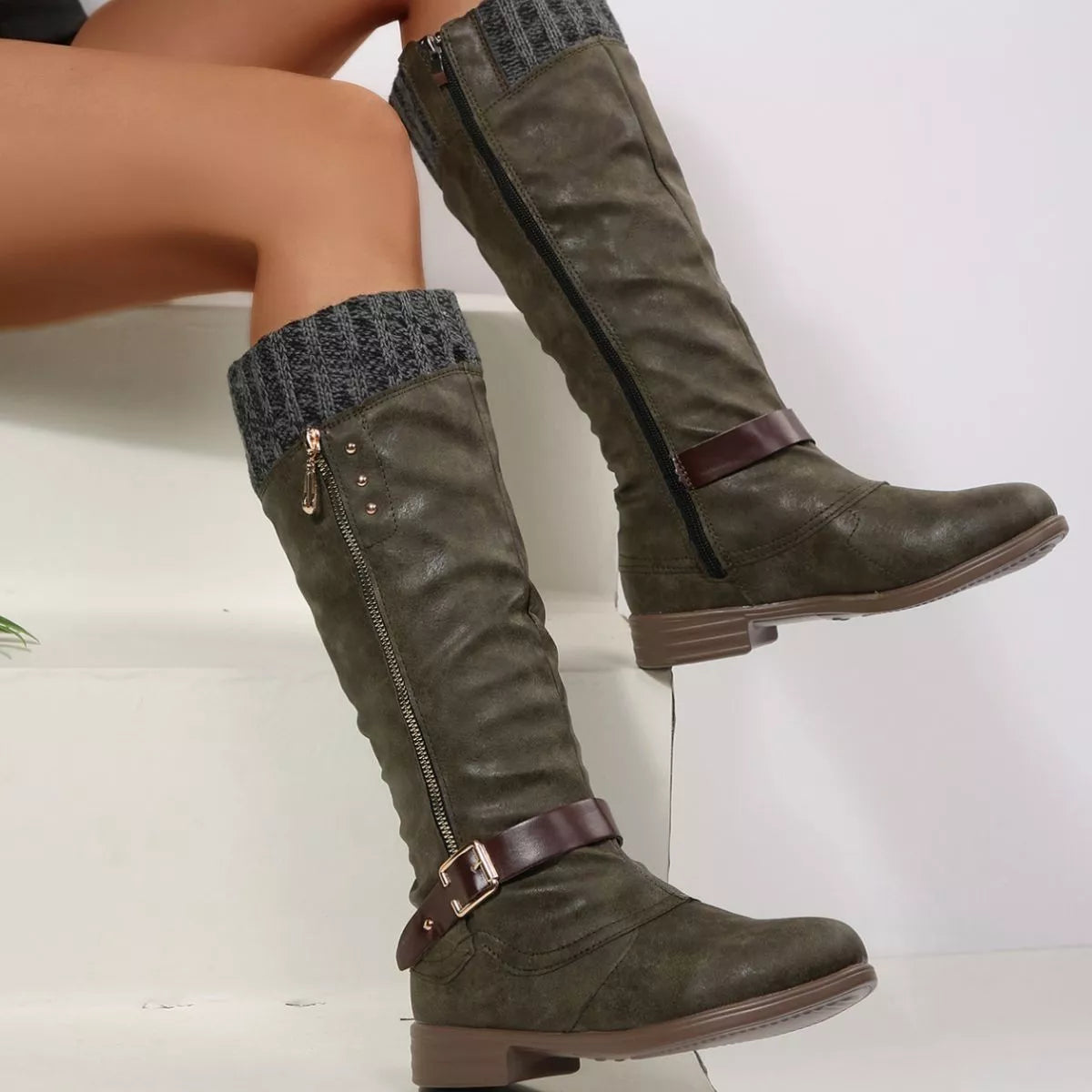 Red round toe block heels boots pair standing together
