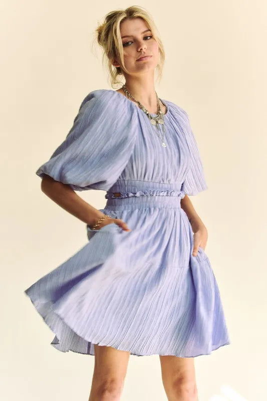 Back Button Puff Sleeve Mini Dress in Lavender on model