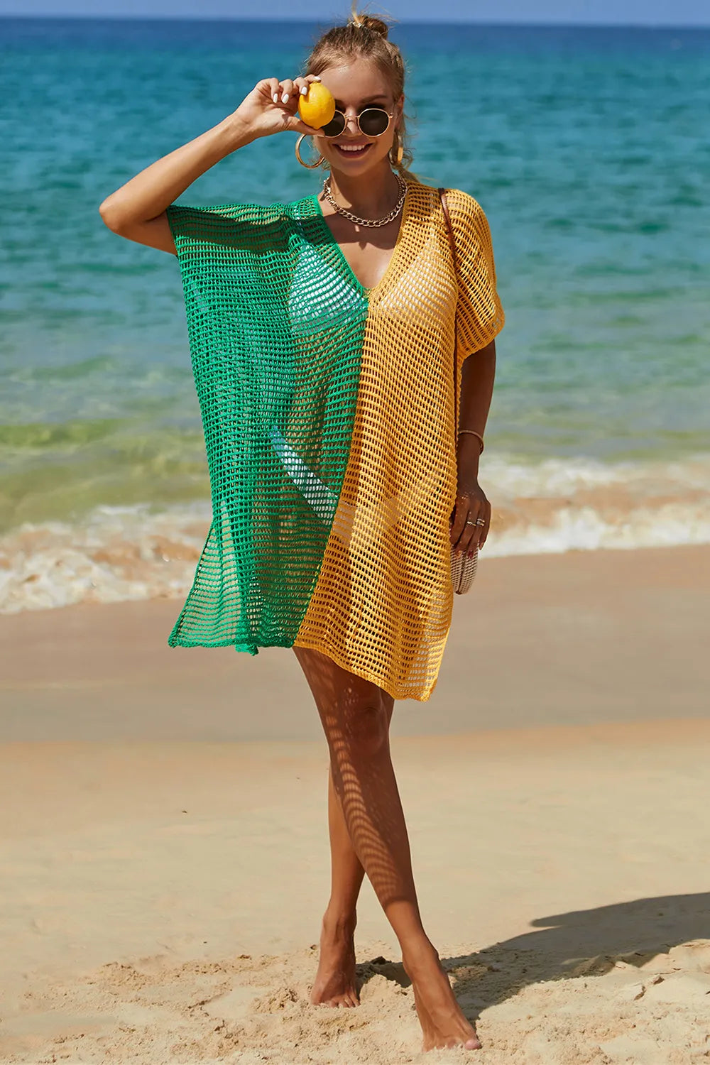 Detail of hem and contrast trim on knit cover up