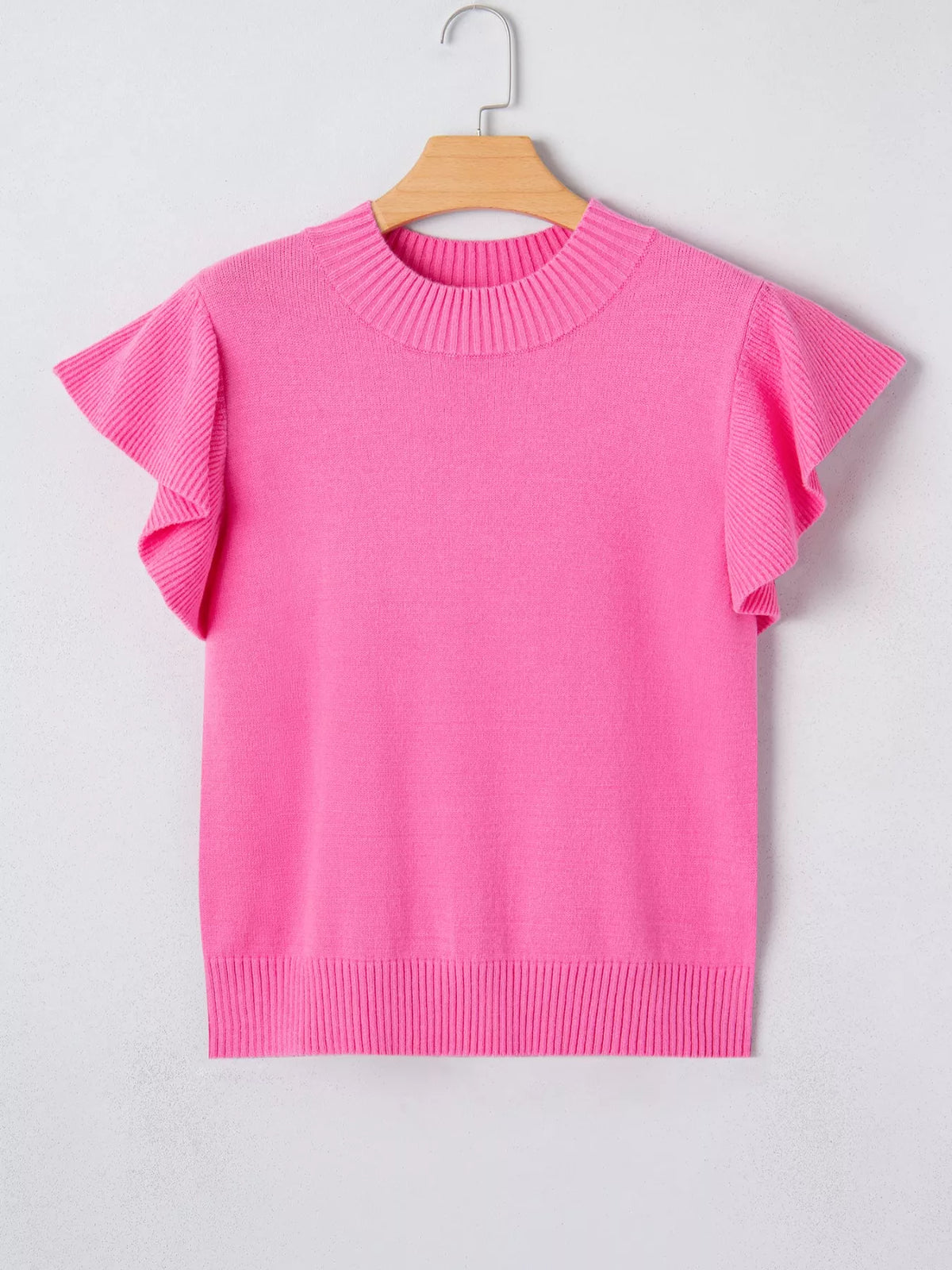 Fuchsia sweater styled with denim