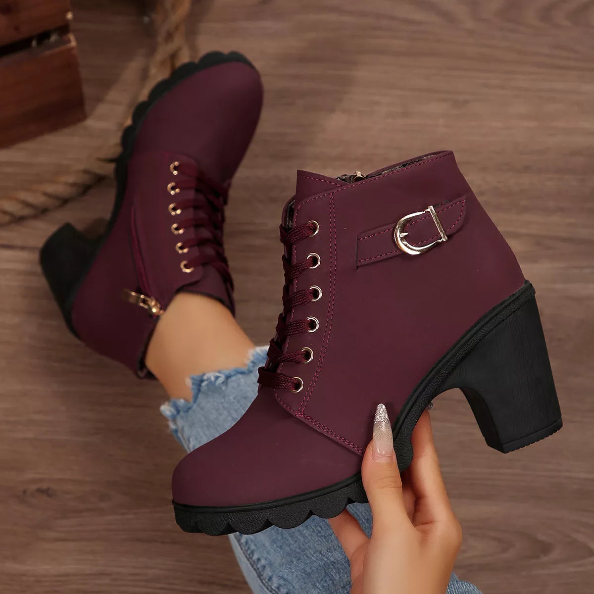 Lace up block heel suede boots worn with cropped jeans