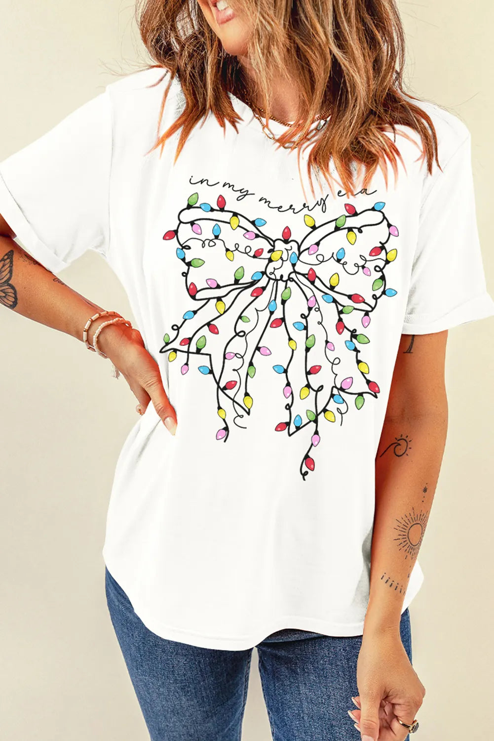 Round neck bow top styled with jeans