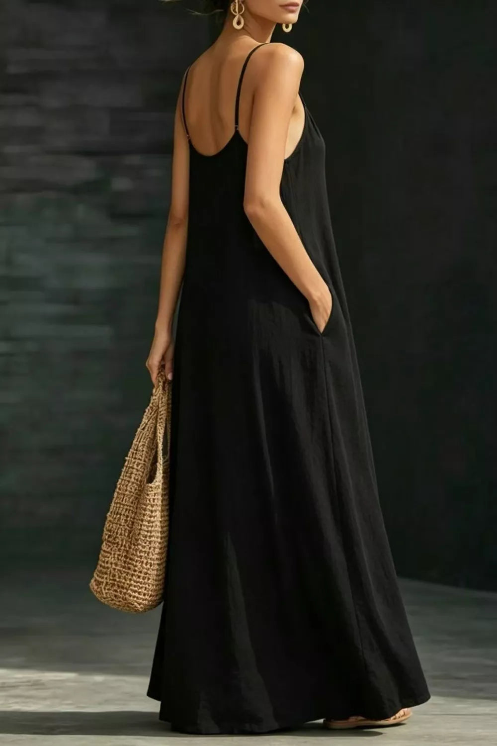 Black sleeveless maxi dress pocket detail
