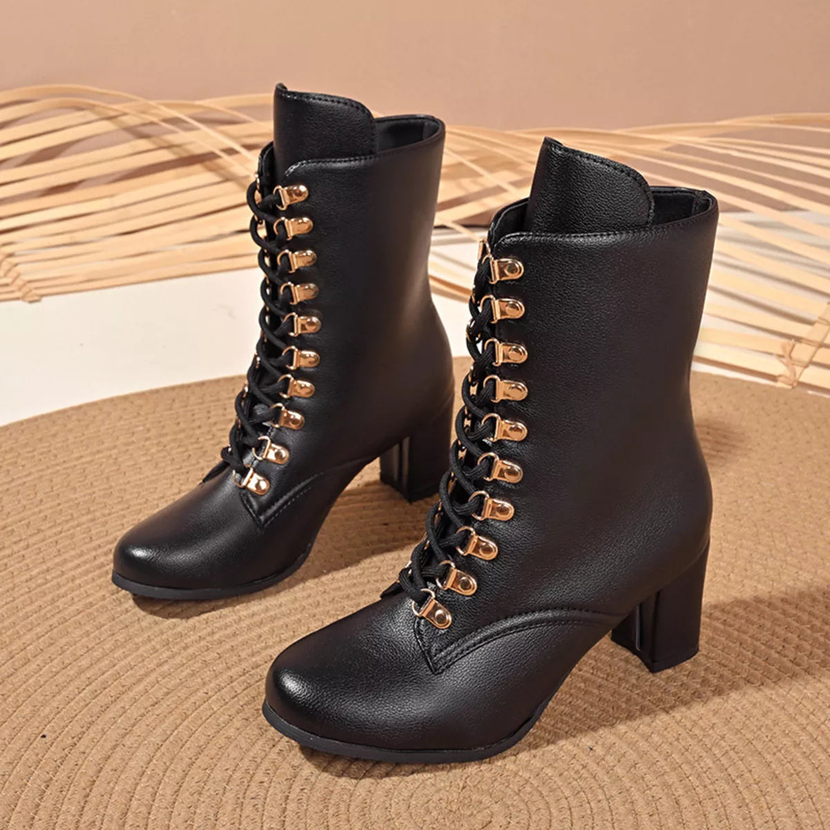 Lace up block heel boots pair view