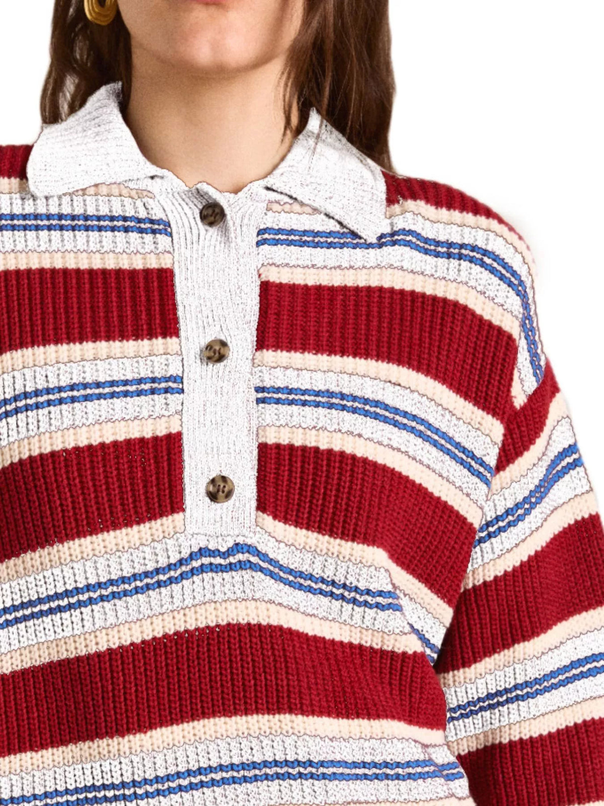 Striped polo sweater styled with skirt