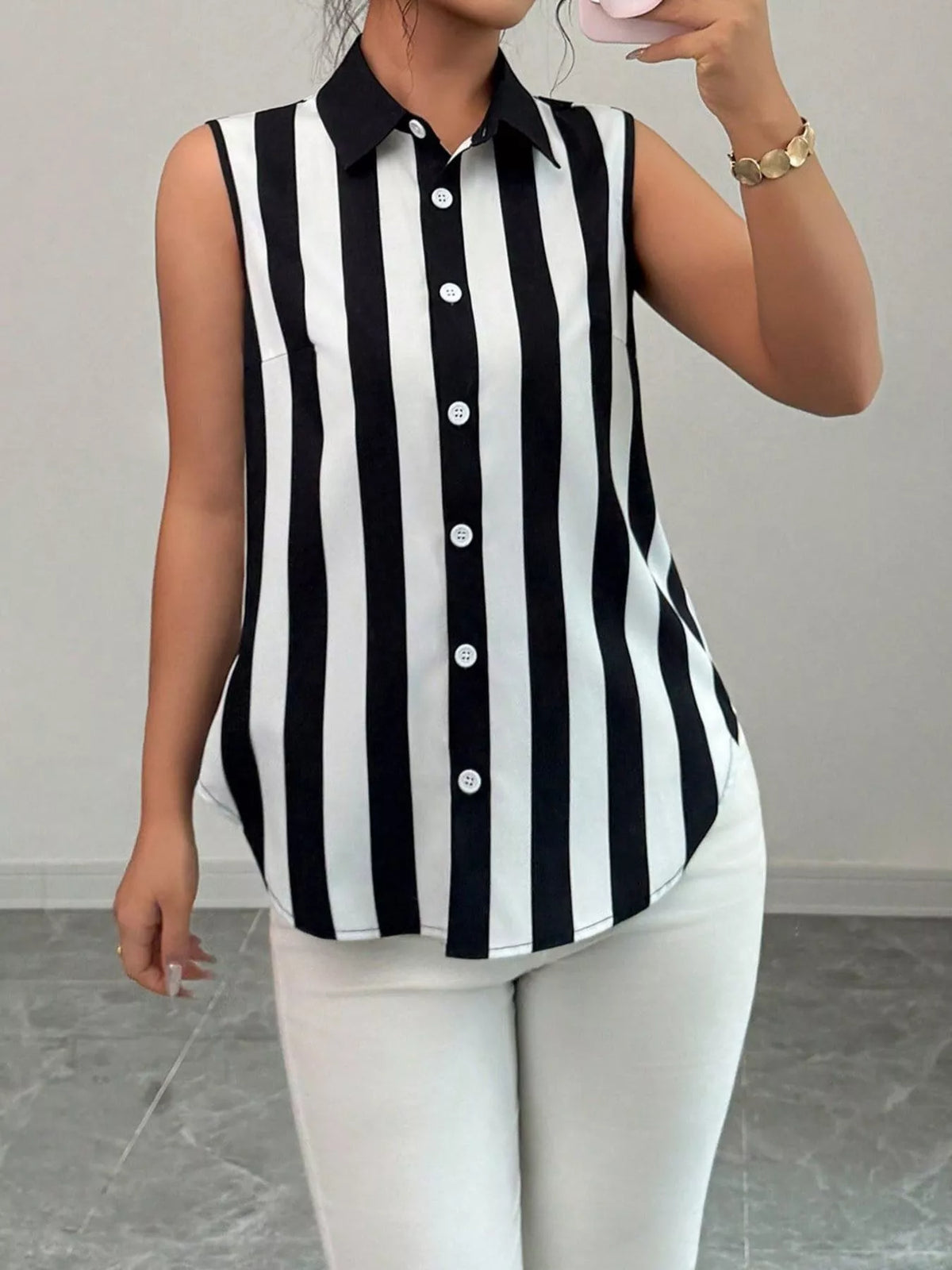 Button up sleeveless shirt hem detail