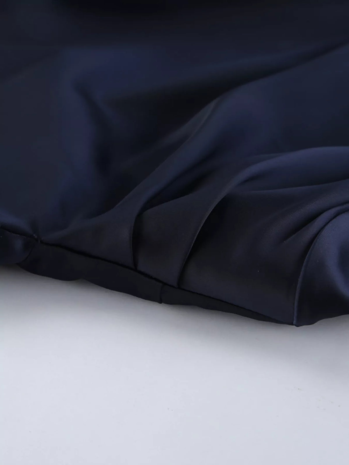Dark Navy mock neck flounce sleeve dress three quarter view