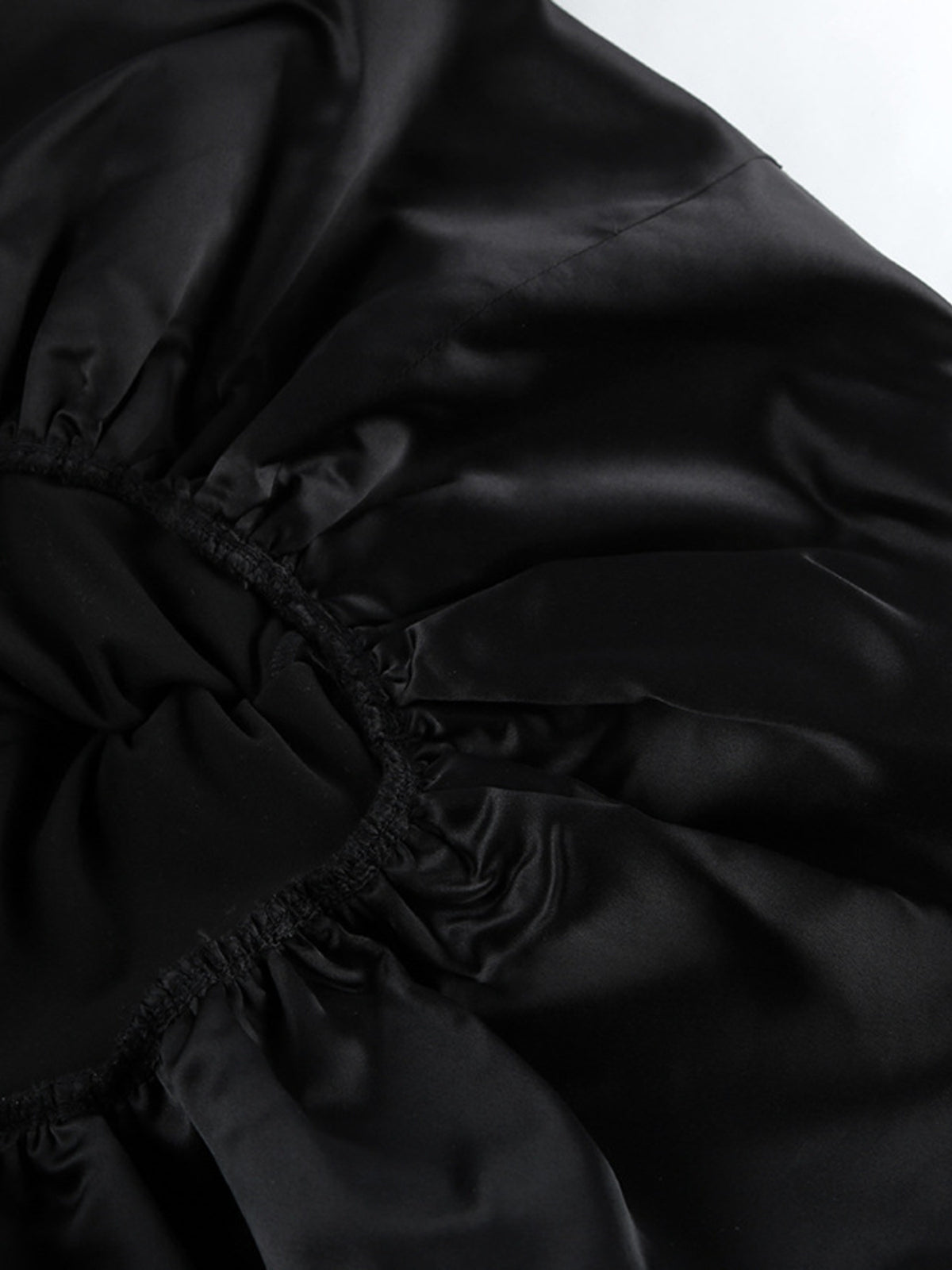 Black off shoulder ruffle hem mini dress hemline detail